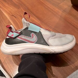 Gray Nike tennis shoes super cute design on the side